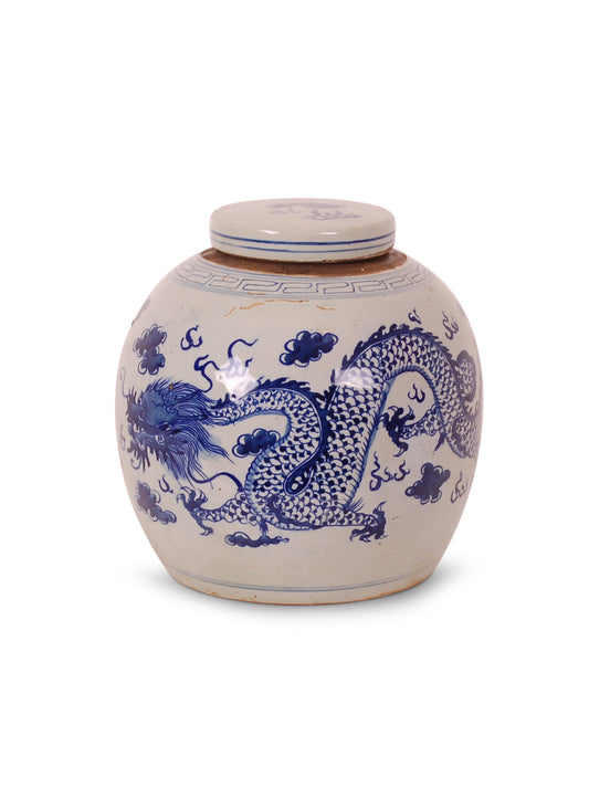 Porcelain, lidded jar with blue and white dragon jar design.