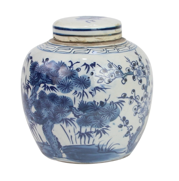 Ceramic mini ginger jar with blue floral patterns on a white background