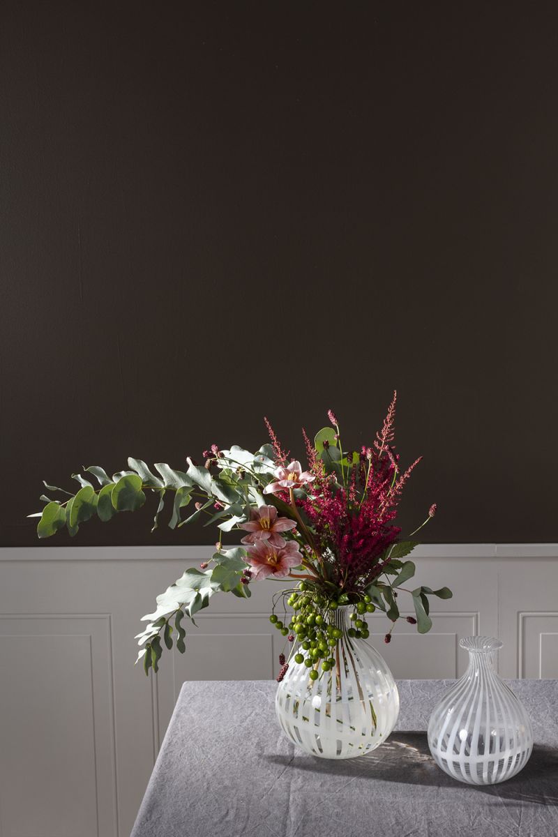 Clear and white striped bud vases in two sizes.