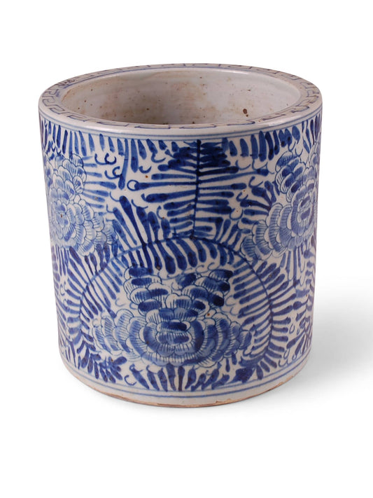 Blue and white palm design on round 8" planter.