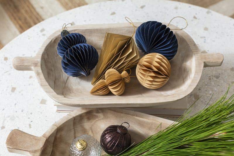 arved wood bowl with handles at either end