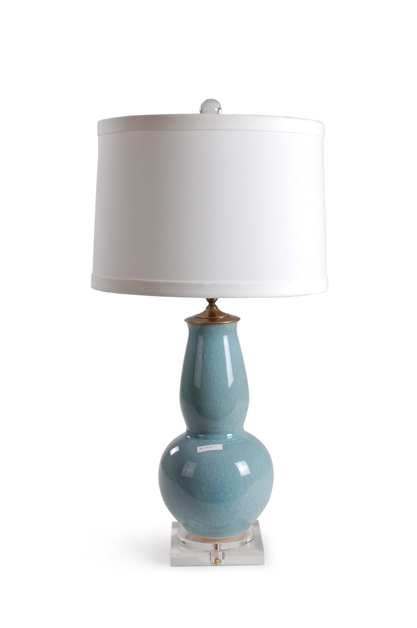 Large scale porcelain vase lamp with light blue crackle glaze. Comes on an acrylic base with 0.5″ trim white drum shade. 