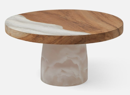 Teak and resin, two materials handcrafted together, bring a splash of color to any setting. These two-tone cake stands are hand-dipped, making each one-of-a kind.