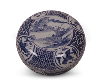 Large circular, porcelain box with blue and white bird and flower design.