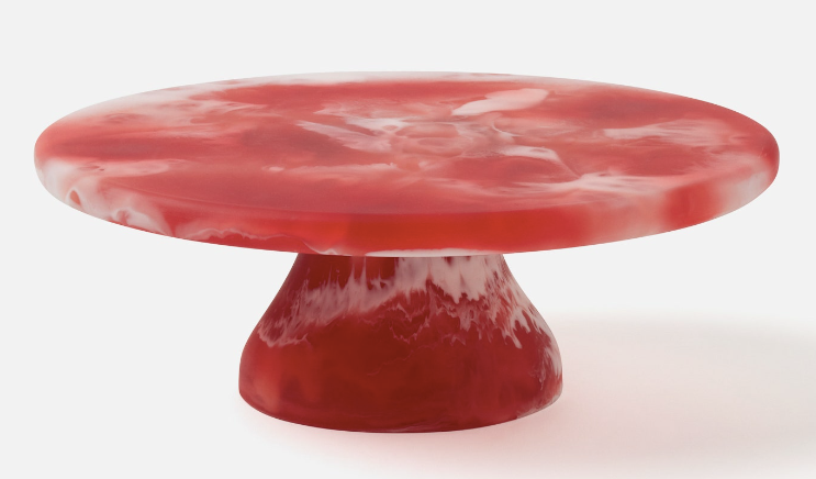 Two-toned resin swirled cake stand in berry.