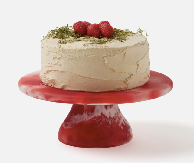 Two-toned resin swirled cake stand in berry.