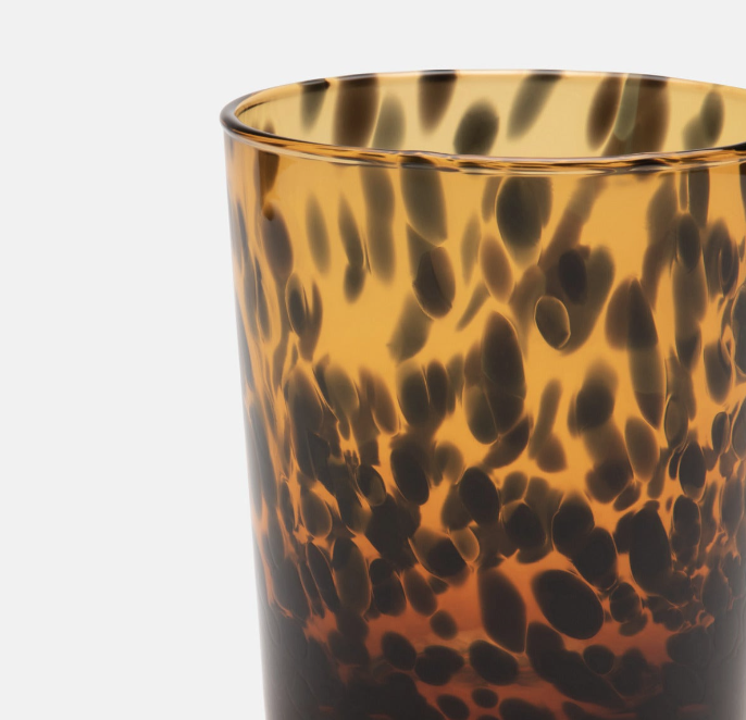 hand-blown glass tumbler in a tortoise shell pattern 