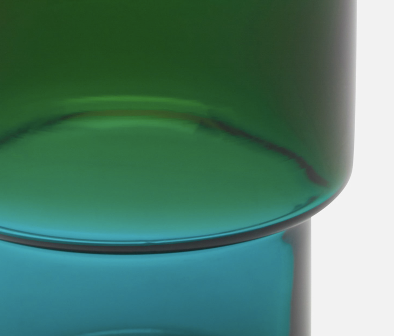 Stackable tumblers with a dark green top and teal bottom.