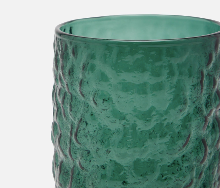 deeply rippled texture give this hand-blown glassware in smokey green.