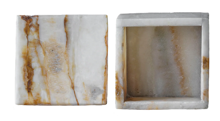 Crafted from brown onyx, which is plush with white and tawny brown banding, the Onyx Box is an attractive storage accent. Each piece is unique based on the stone's natural colorations.