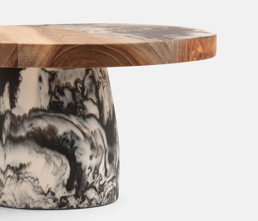 Teak and resin combine to create a two-tone cake stands that are hand-dipped, making each one-of-a kind.