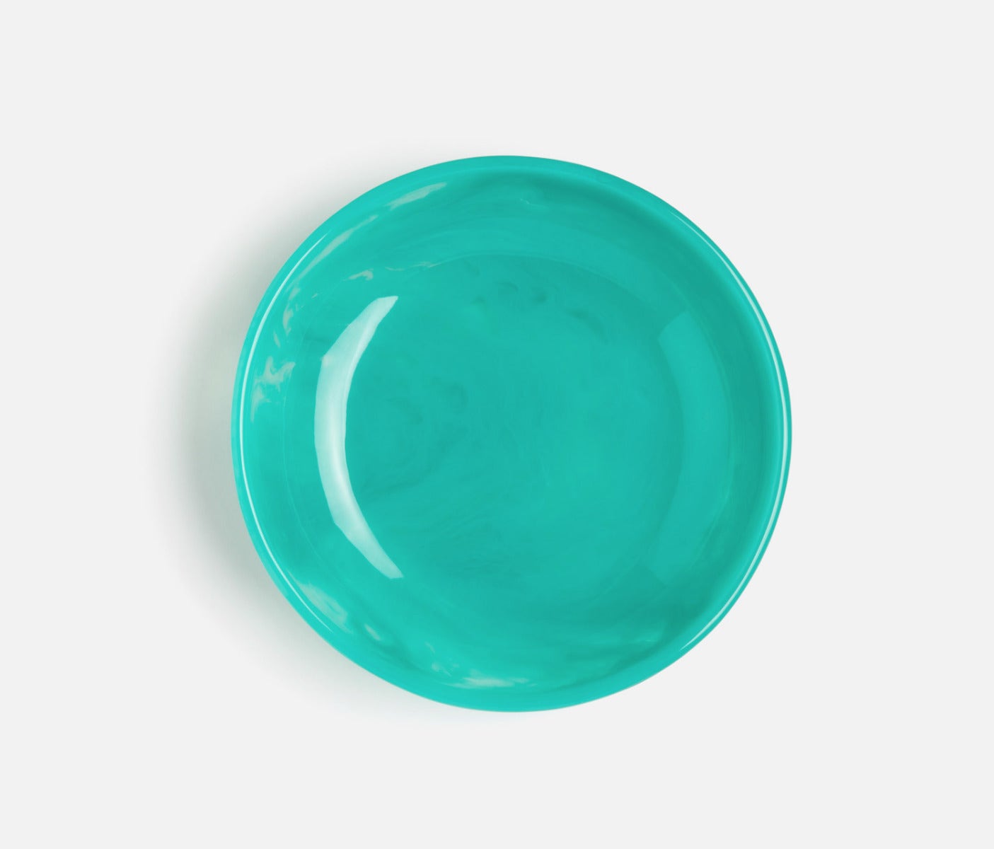 Turquoise serving bowl  made of resin.