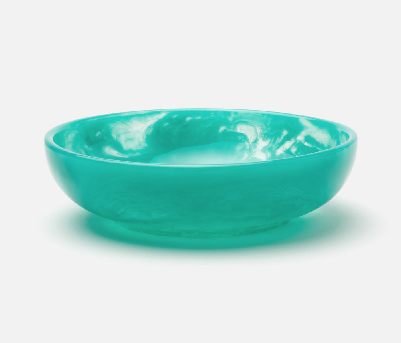 Turquoise serving bowl  made of resin.