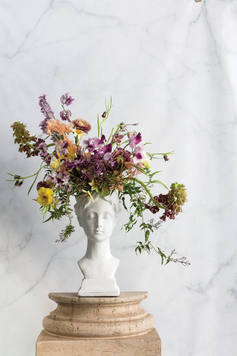 The Helena vase is lightweight concrete and can be used alone or as a vase or planter.