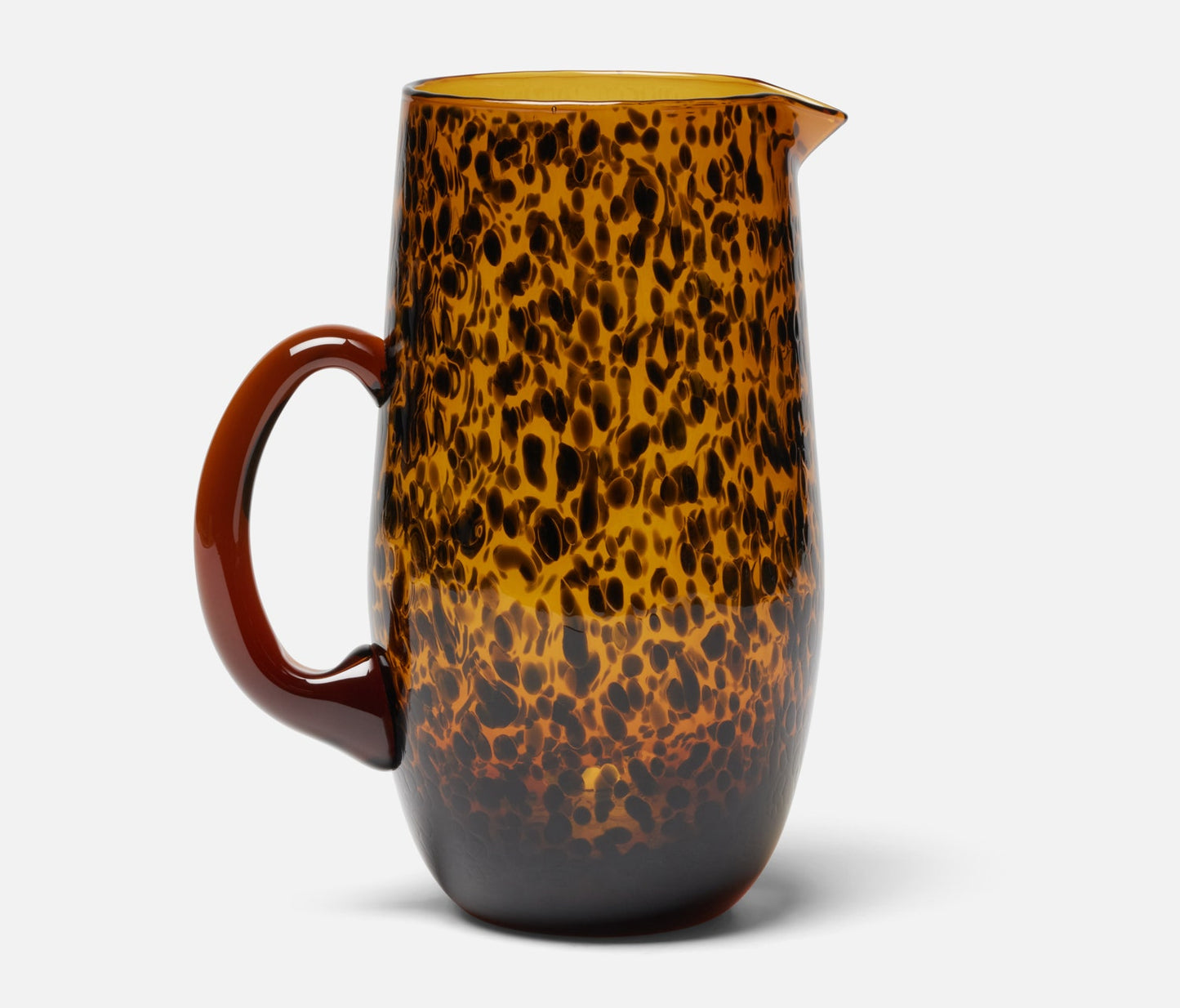 Pitcher made from hand-blown glass in a tortoise shell finish.