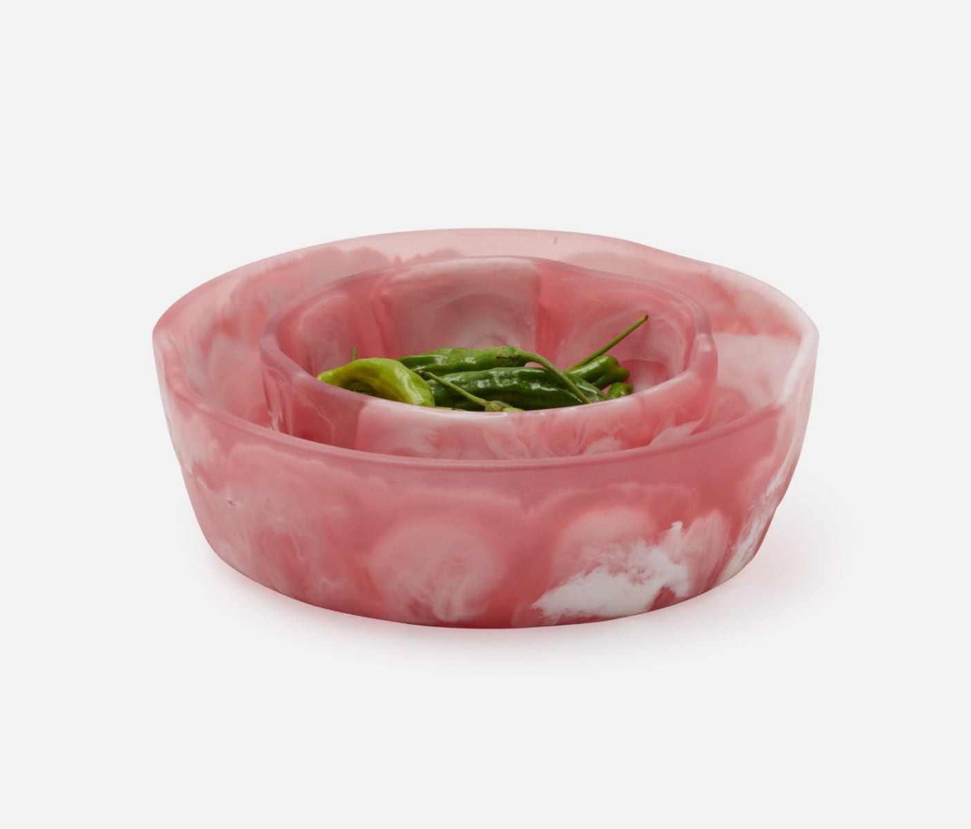 Swirling resin and irregular shapes give this generously proportioned serving bowl set a natural, laid-back vibe. Eye-catching and versatile, Beatrix brings unconventional beauty to the kitchen, dining room, or patio.