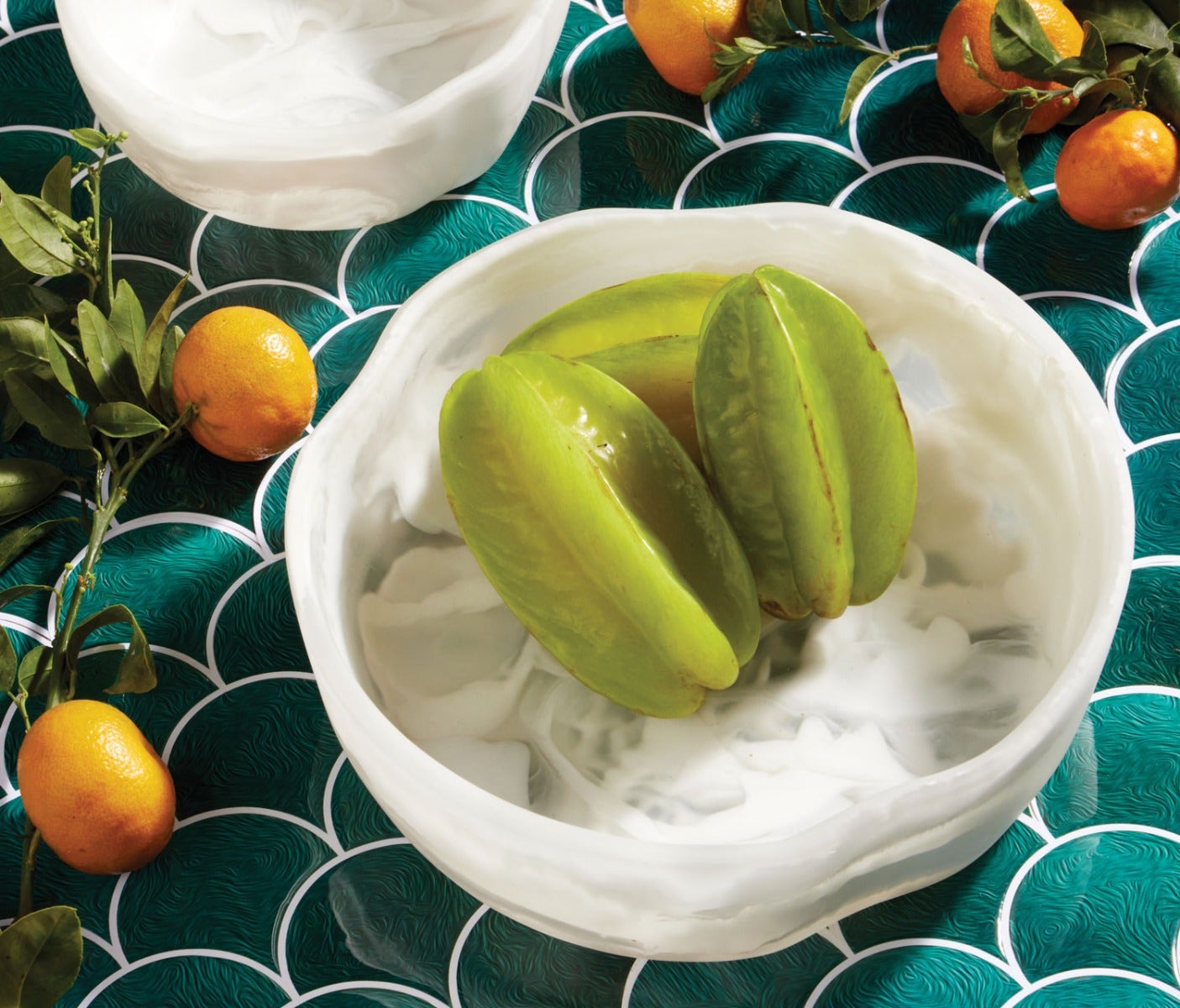 White swirled resin serving bowls.