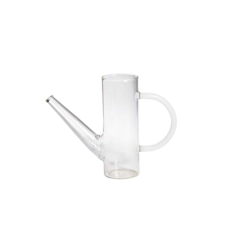 Delicate glass watering can with white glass handle and elegant spout makes a perfect decorative or useful piece for every floral design.