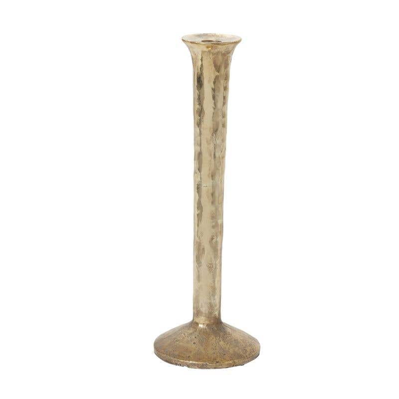 spool-shaped metal candle holder is made from polyresin with a mottled gold finish